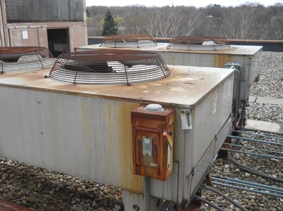 rotted_AC_unit_on_roof.jpg